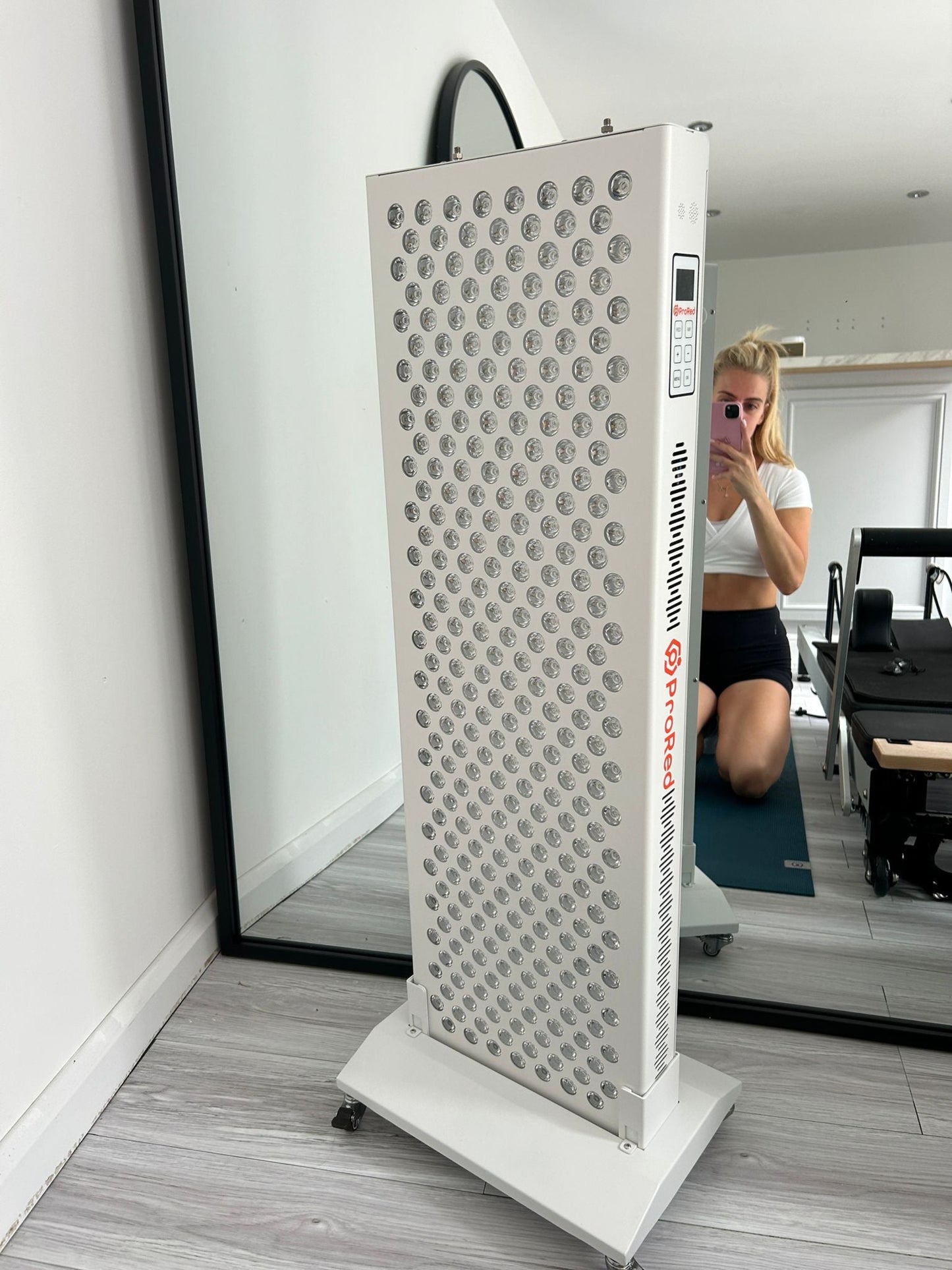 Lady sat with ProRed1500 in Studio